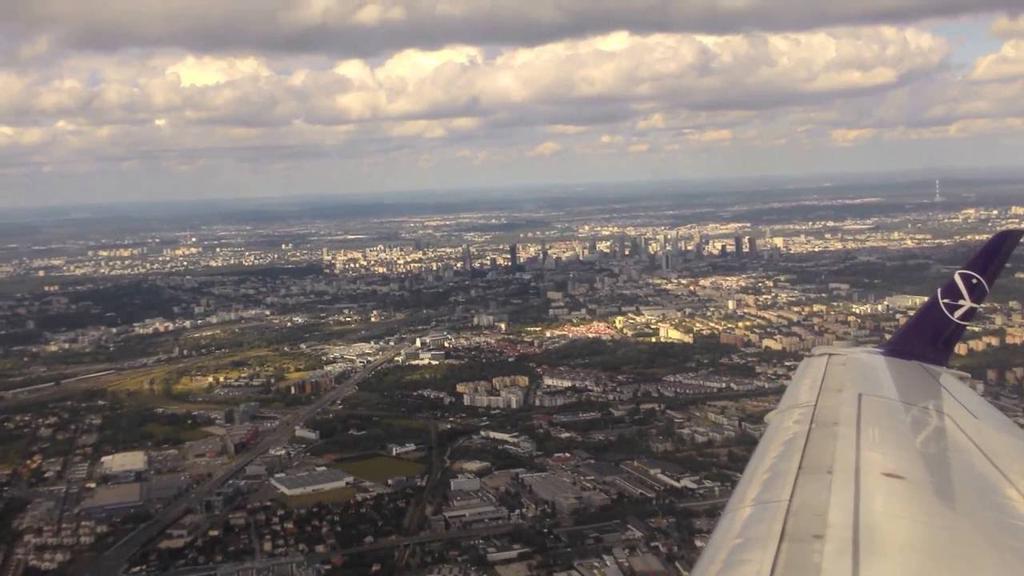 'Video thumbnail for Take off in Warsaw with clear skyline view'
