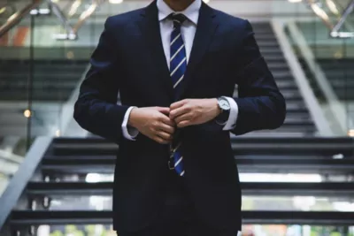 Formal Gift Ideas: Business Travellers Guide : Man wearing gifted watch in office