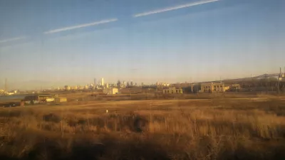 Мировое турне второй континент: прибытие в США : Вид на Манхэттен в поезде из Нью-Джерси